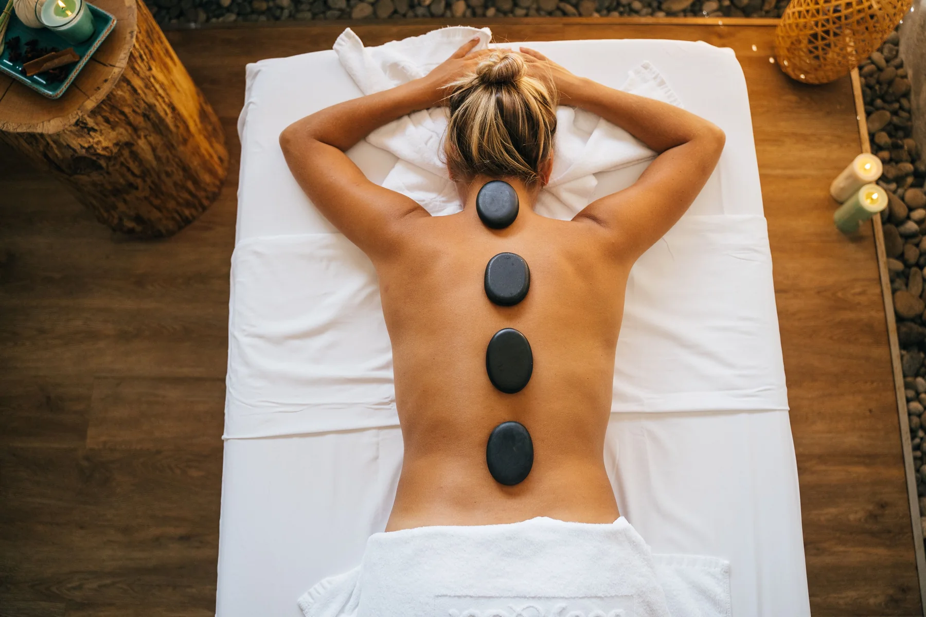 Professional hot stone massage in a tranquil spa setting