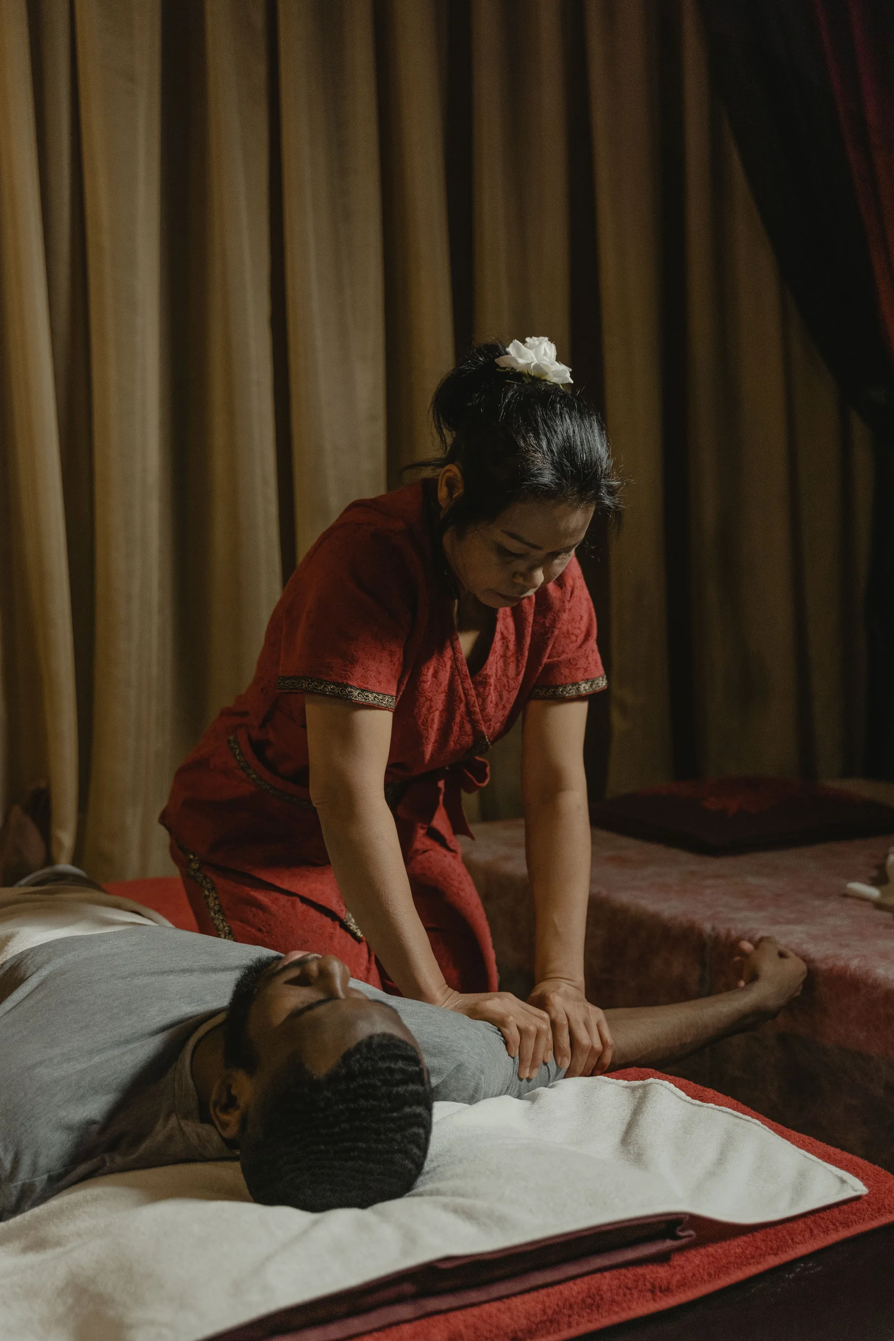 Professional massage specialist providing a spa service